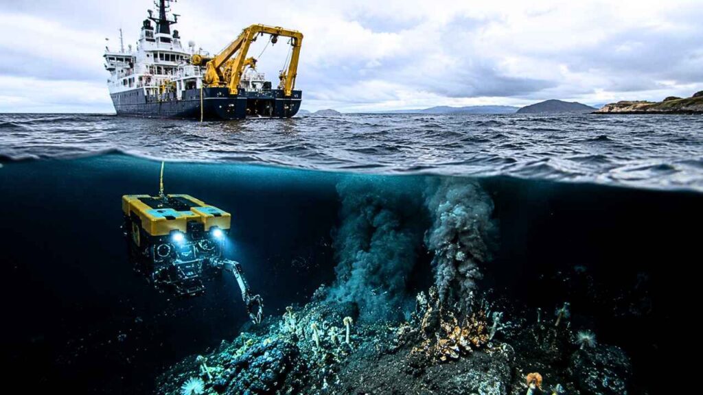 Navio científico e robô submarino investigam fontes hidrotermais no fundo do oceano durante estudo sobre como formas de vida abissais podem influenciar o ciclo do carbono e o clima global.